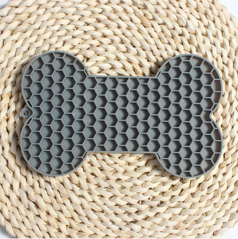 Tappetino in silicone per cani a forma di osso – leccalecca slow feed